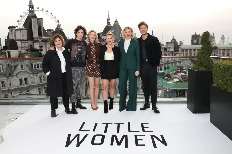  Saoirse posed with co-stars and colleagues in front of London’s skyline