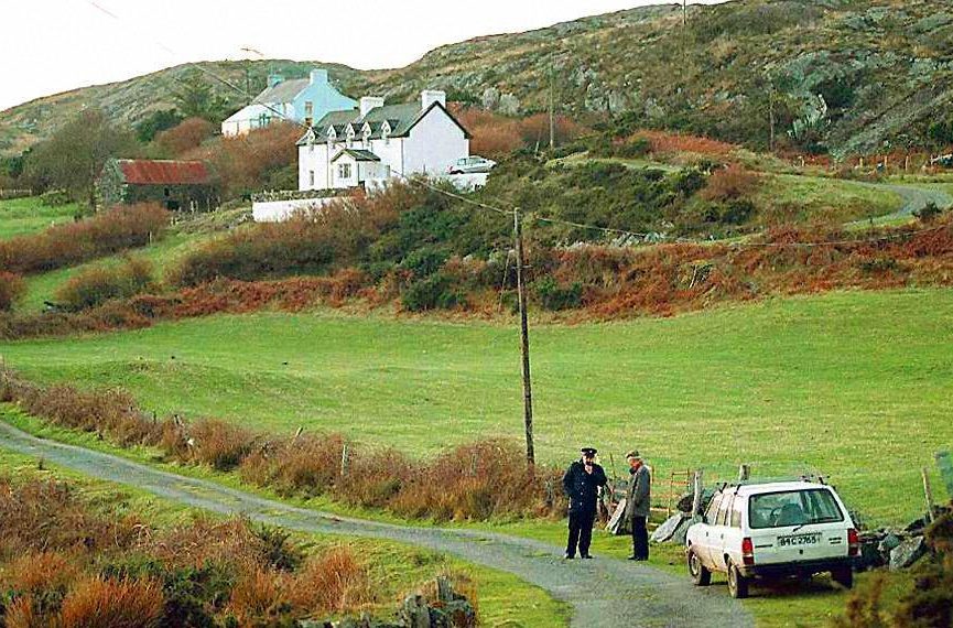  A policeman stands at the road leading to Sophie's holiday home the day after her murder