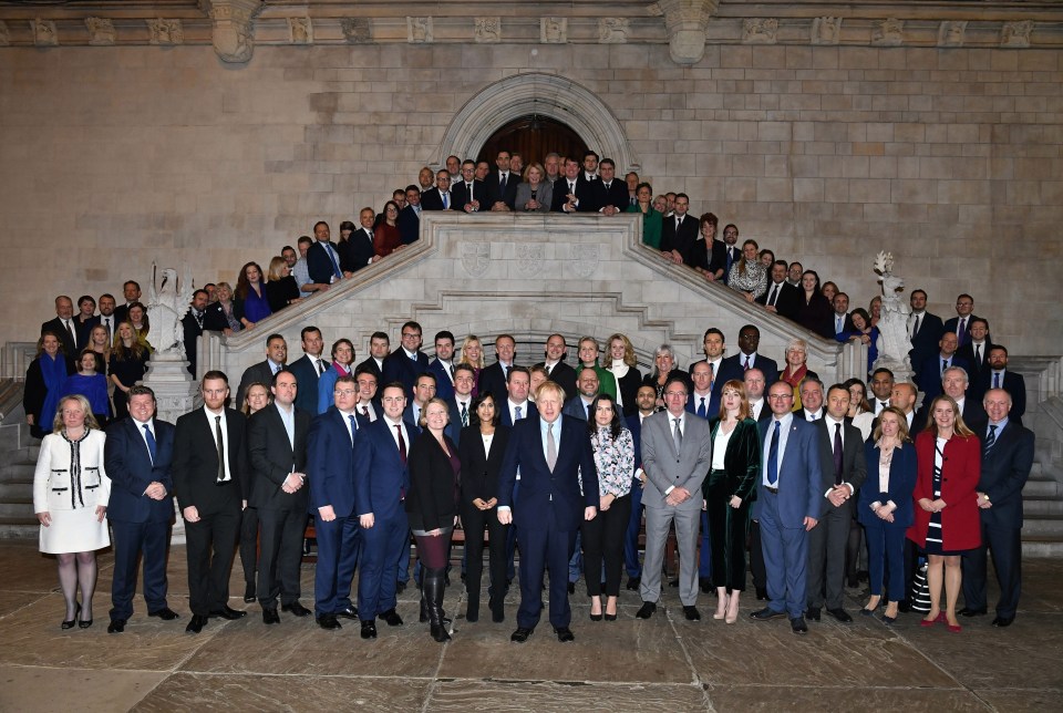 Boris Johnson with his newly-elected MPs today