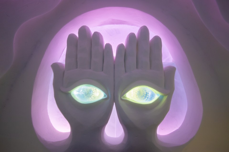 The sixth sense is a big theme in the room with the large eyes and hands to "protect" you