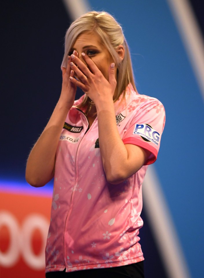 Sherrock reacts after she becomes the first female to win a game in the PDC World Championships