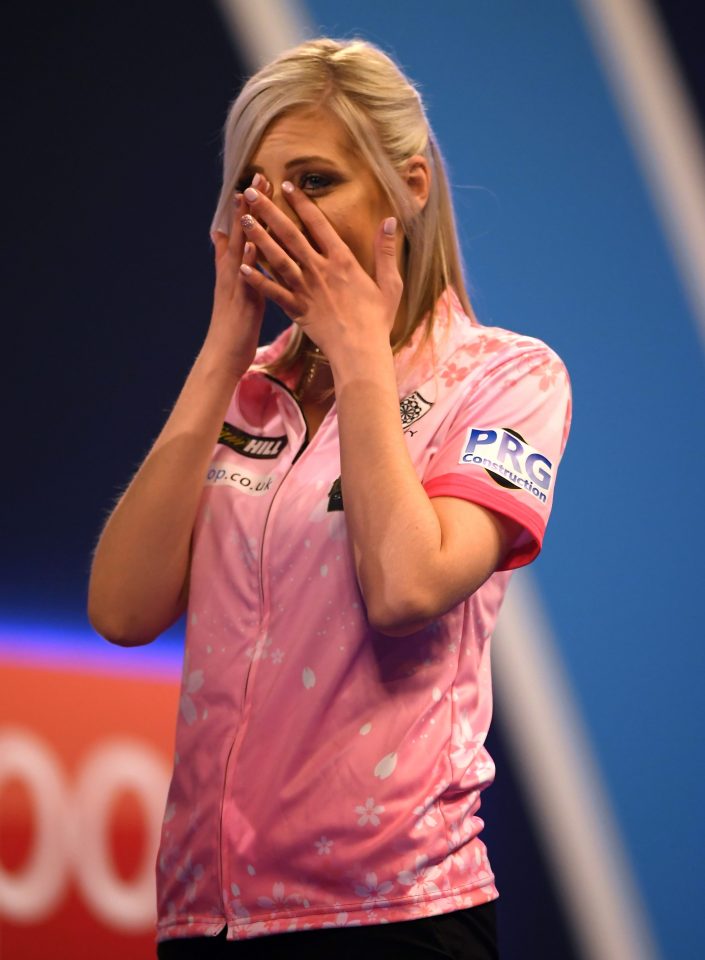  Sherrock reacts after she becomes the first female to win a game in the PDC World Championships