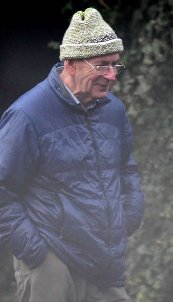  Fred Talbot was covered up in a scruffy jacket and hat during his stroll