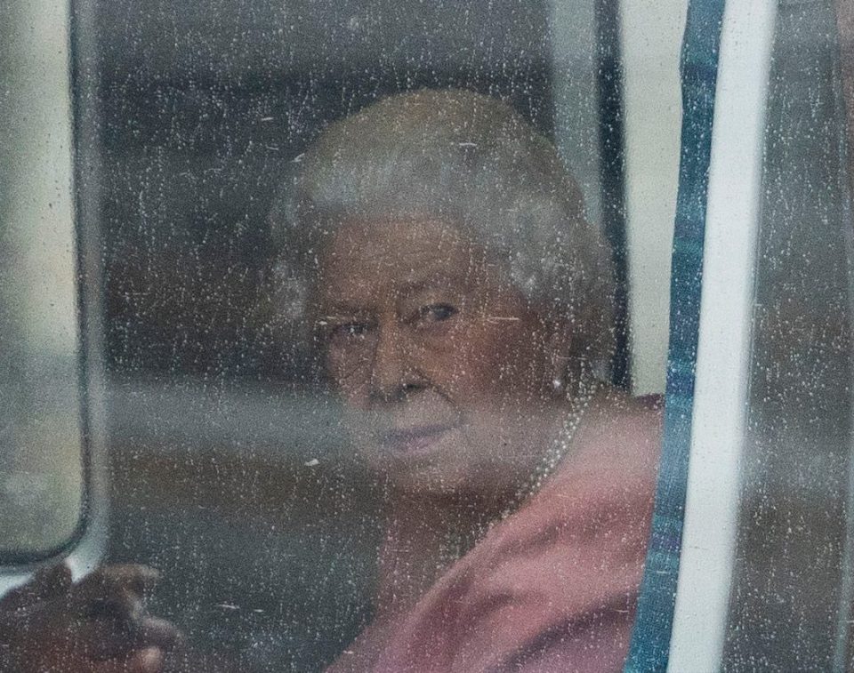  Her Majesty is pictured on a train to Sandringham yesterday