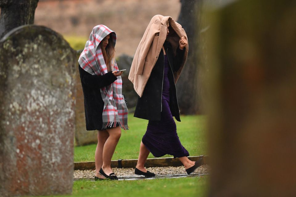  Friends started arriving in the rain to pay tribute to the young woman