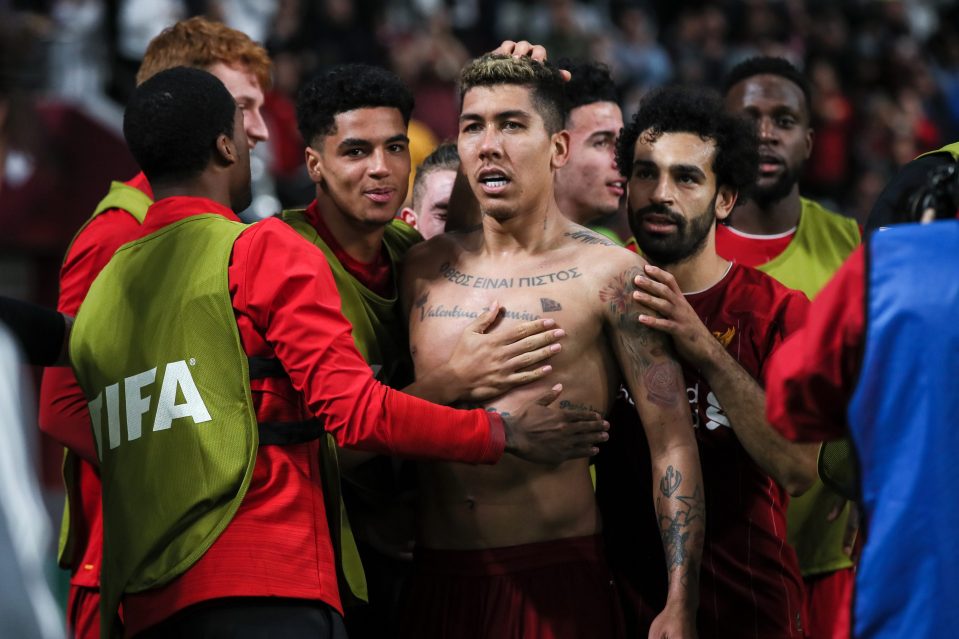  Firmino was mobbed by his teammates as he celebrated his winner