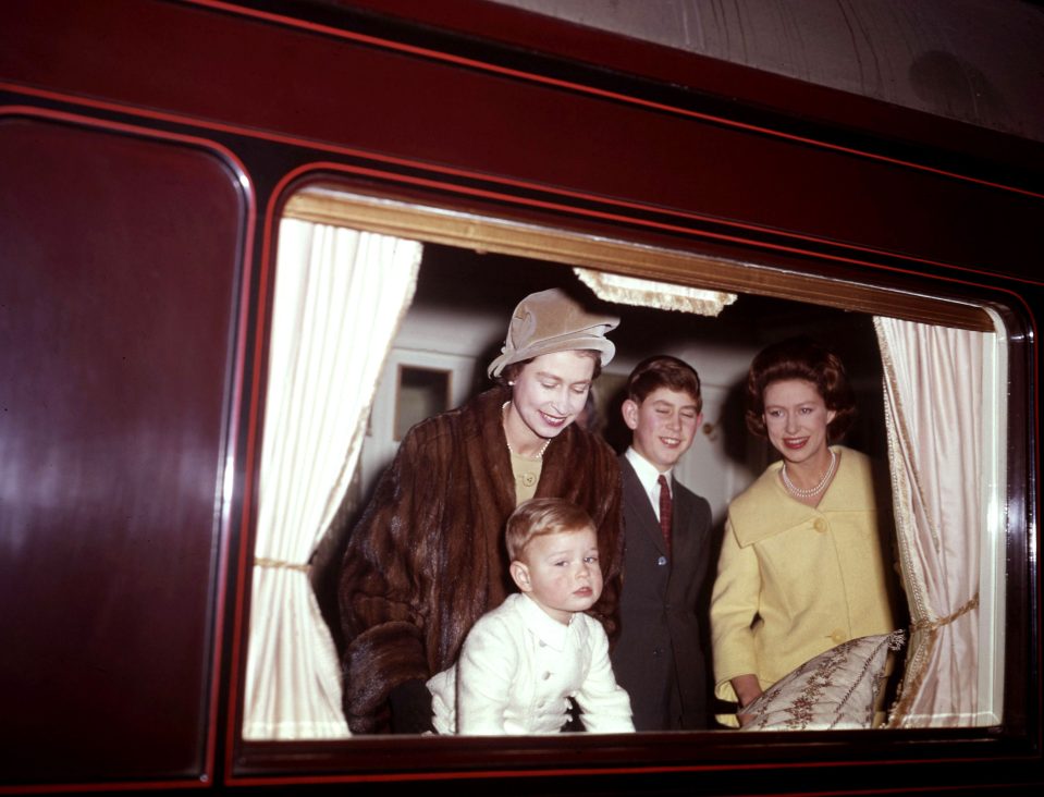  The Queen makes her way to Sandringham with Prince Andrew, Prince Charles and Princess Margaret in 1962