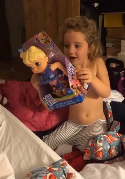  Kieran shared clips of the children opening gifts