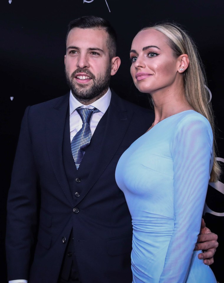  Alba smiles with his wife Romarey