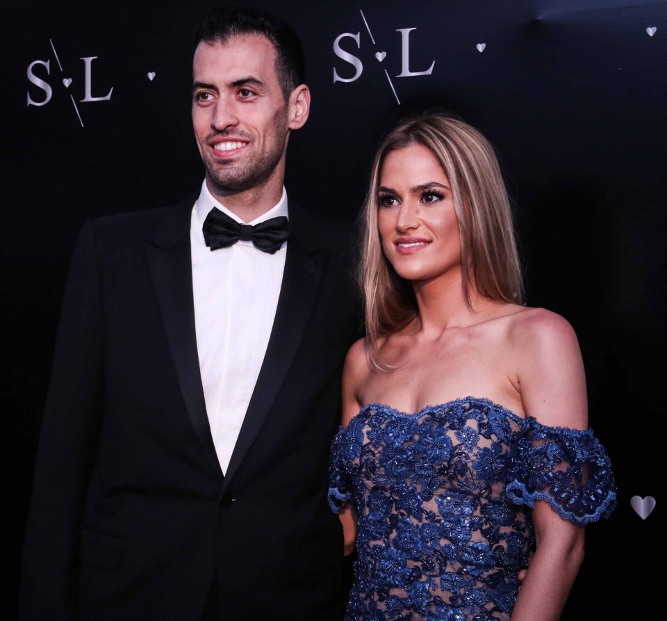  Busquets looked smart with wife Elena