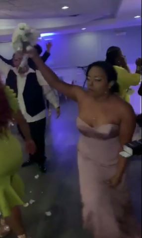 A wedding guest has been branded "obnoxious" after she stole the bouquet from the woman who caught it