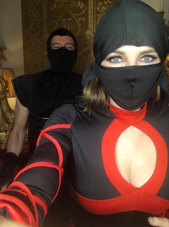  The 54-year-old flashed her cleavage in the revealing black and red costume