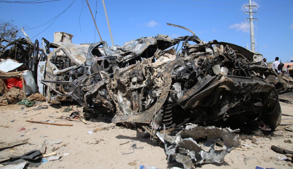  A truck bomb exploded at a busy security checkpoint in Somalia's capital on Saturday morning