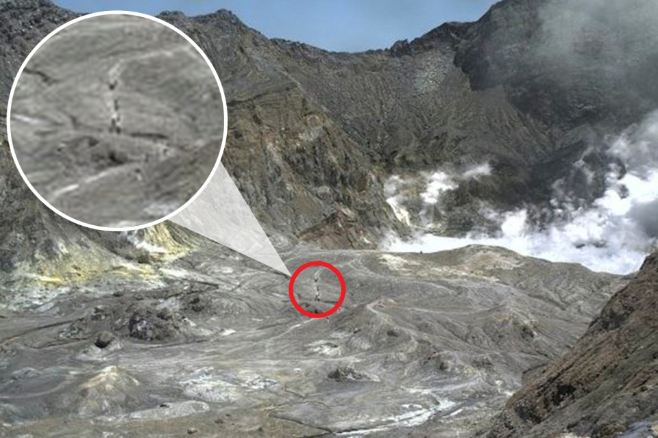  A chilling final photo from inside the crater appears to show a group trekking through the volcano moments before it erupted