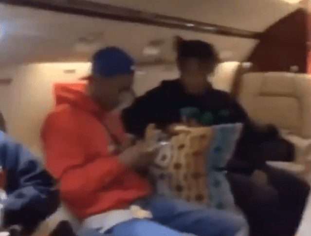  Juice Wrld and a pal seen as the plane comes in to land at Chicago's Midway airport