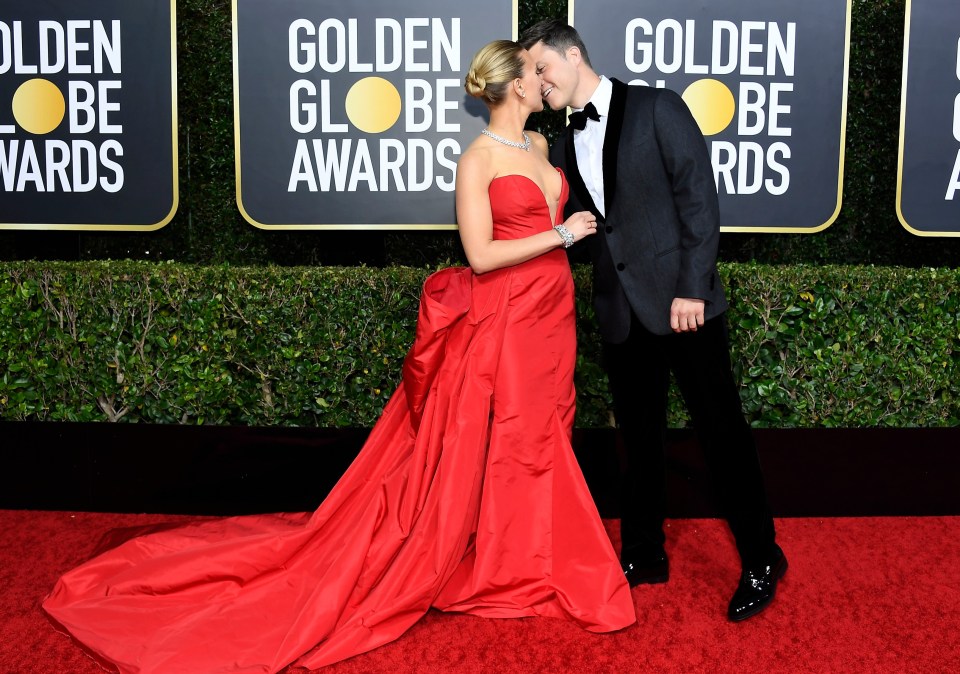 Scarlett and her boyfriend Colin Jost looked like a Hollywood dream as they enjoyed a rare PDA on the red carpet