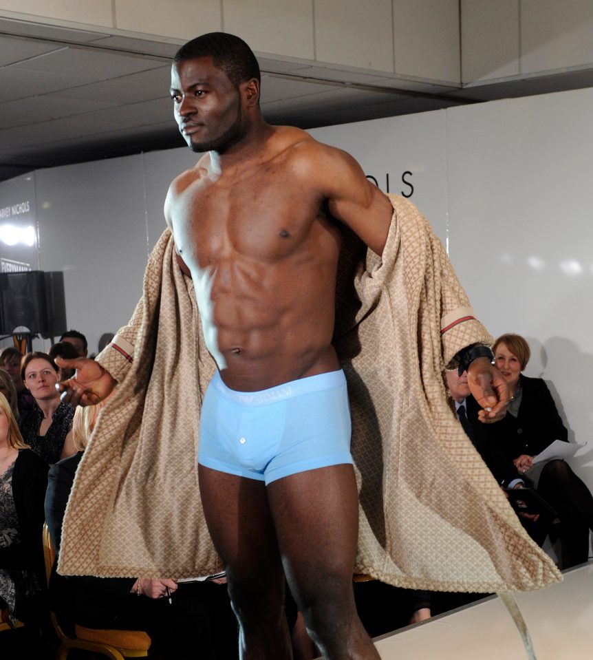  Elokobi even stripped down to his smalls to show off his six-pack for a charity fashion show