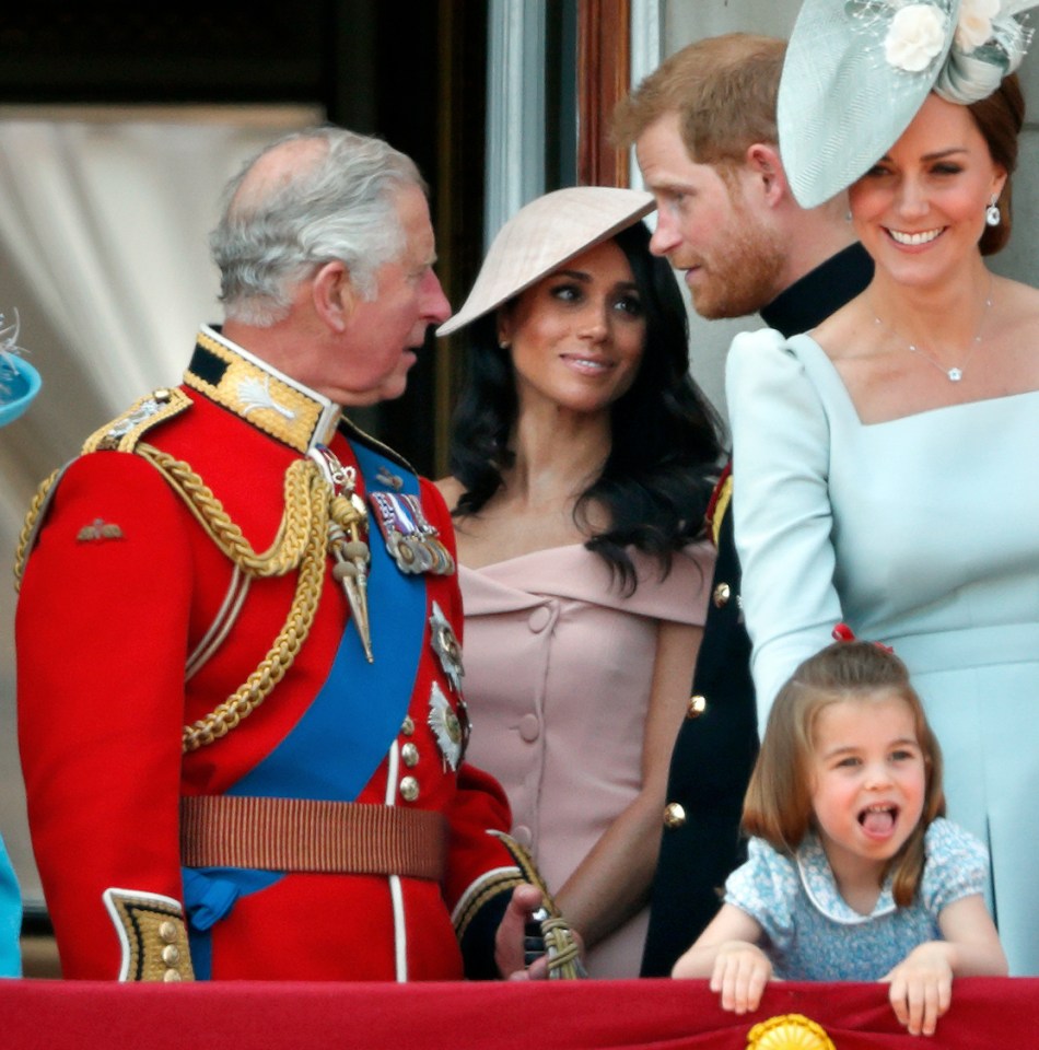 Prince Charles with son Prince Harry and Meghan Markle