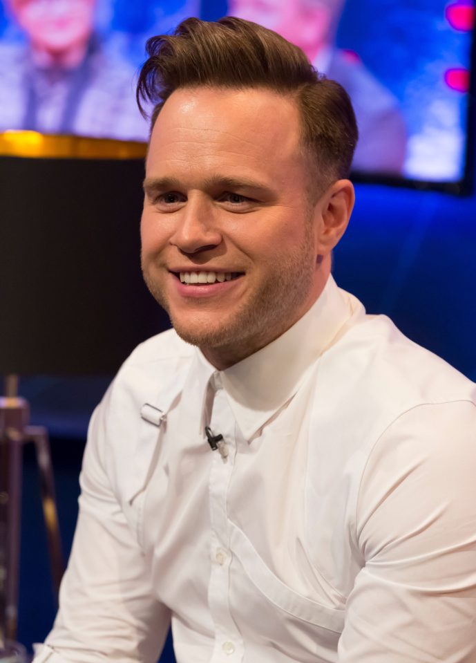 Olly has had a dramatic change of image, with his trademark quiff no more