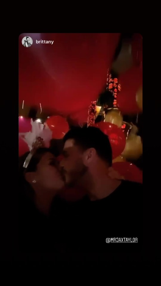  The couple, who married last year, shared a kiss as the balloon drop announced midnight