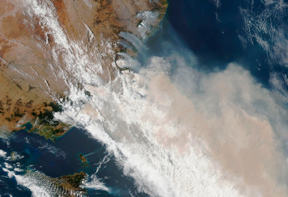  Smoke billowing from Victoria and New South Wales