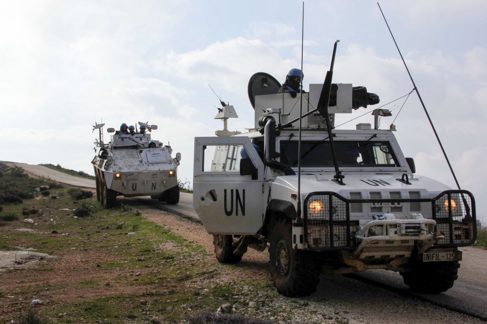 United Nations Interim Forces in Lebanon (UNIFIL) armoured vehicles patrol the area around the southern Lebanese town of Kfar Kila on the border with Israel