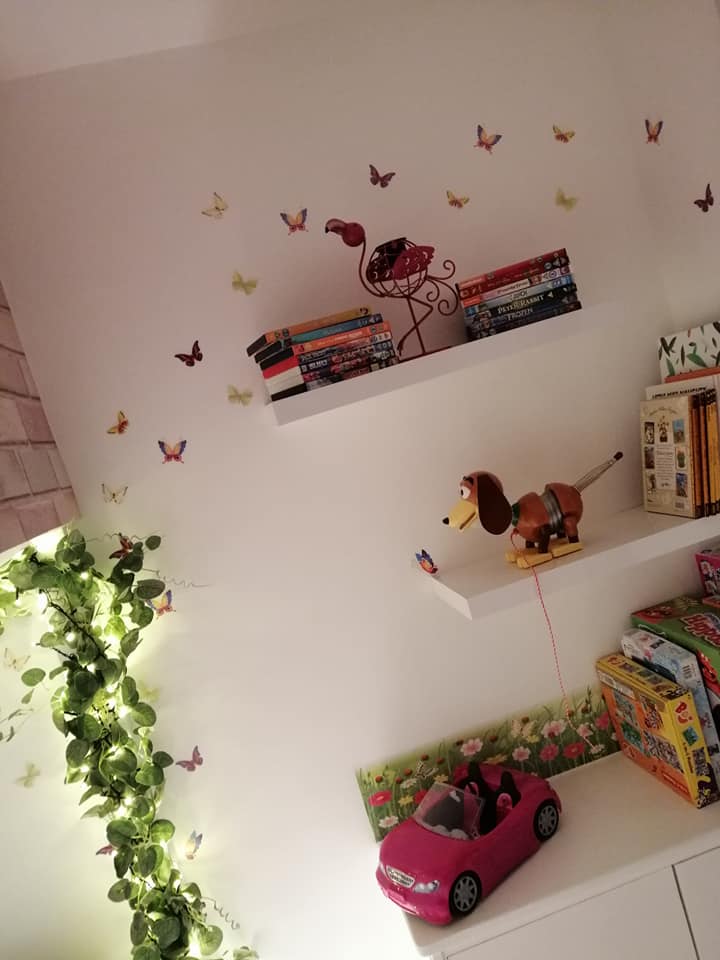 The mum and dad added shelves for all her toys and games 