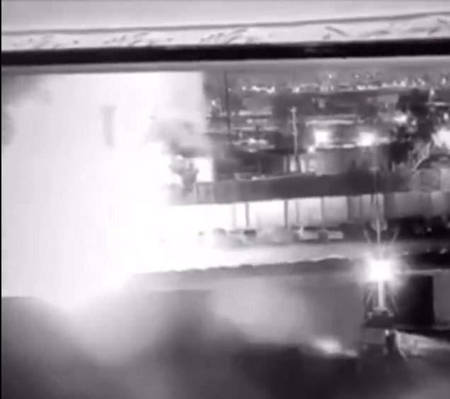 Grainy footage shows the missile strike outside Baghdad Airport