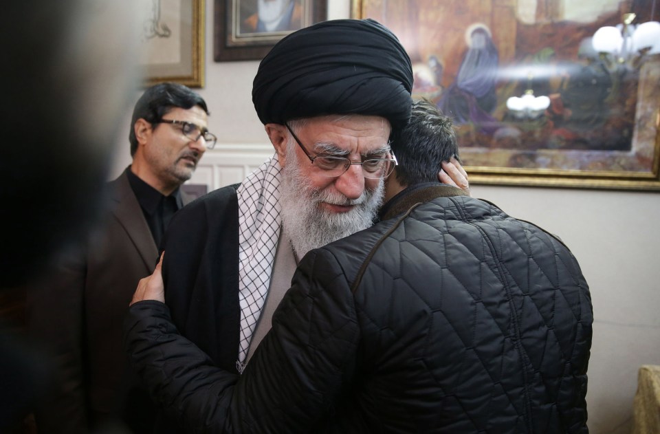  Iran's Surpreme Leader Ali Khamenei is pictured hugging Soleimani's son after news of the general's death