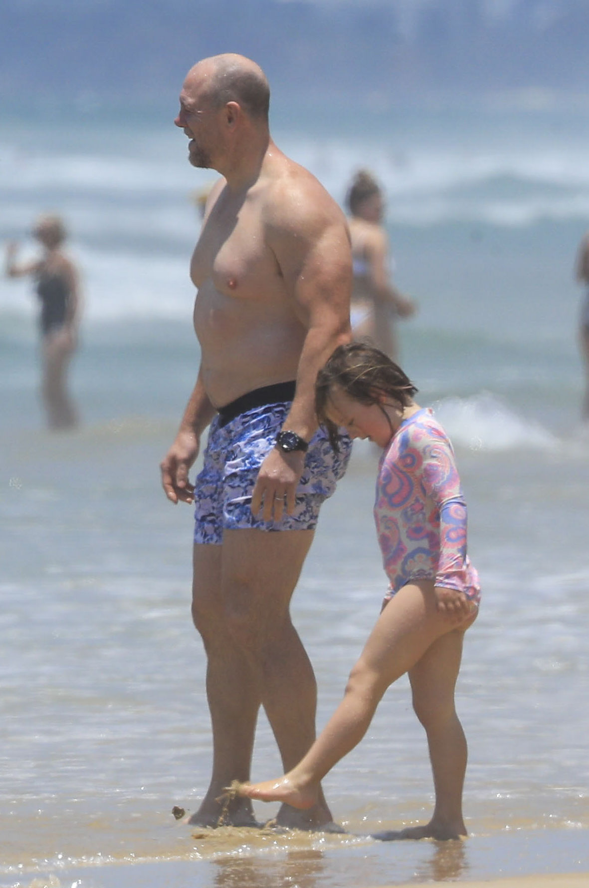 He took a dip in the sea with his eldest child