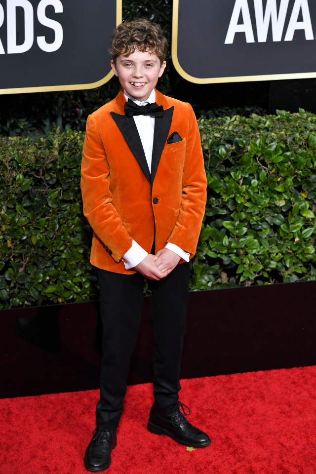 Jojo Rabbit star Roman Griffin Davis looked adorable in a velvet orange jacket