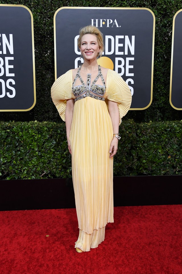 Cate Blanchett wore a bright yellow pleated gown with bejewelled bodice