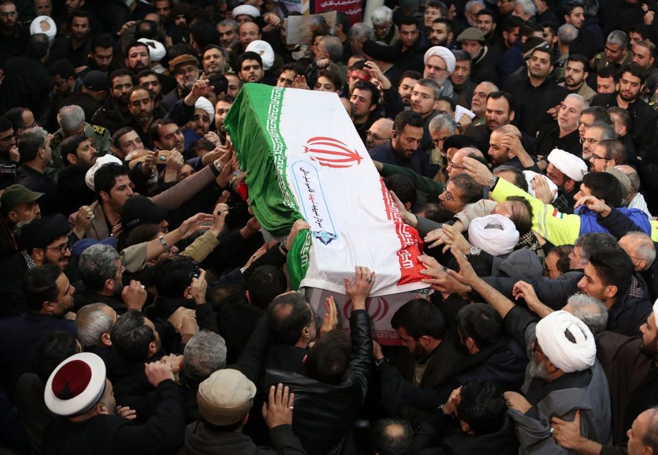  Soleimani's coffin is carried by mourners after he was killed in a US airstrike