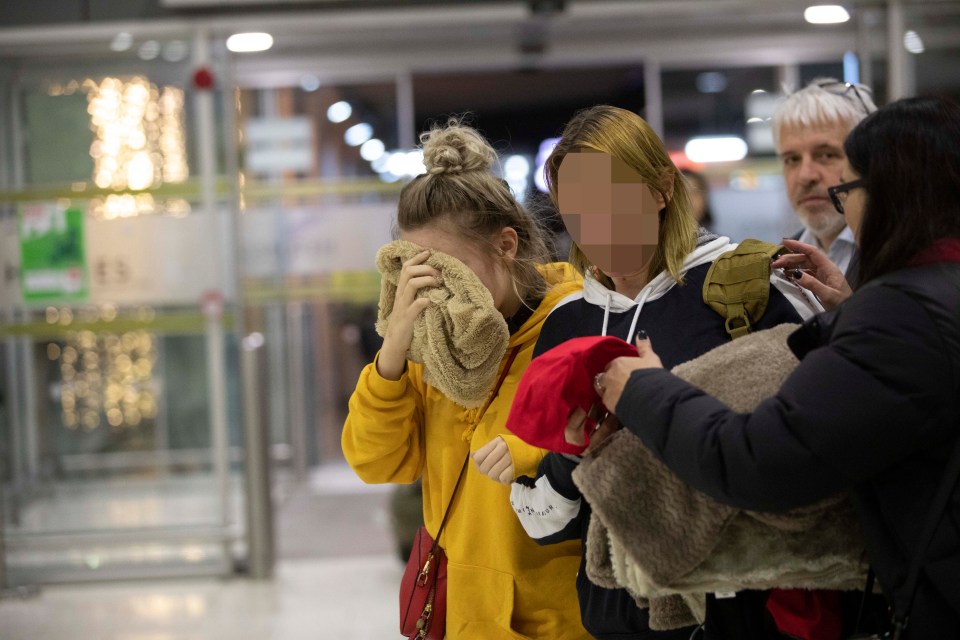  The young woman was photographed with her mother tonight at the airport in Cyprus