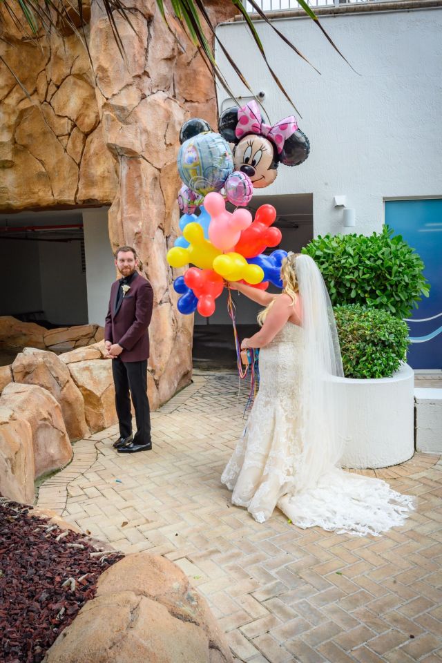  Kristen even had Mickey Mouse balloons on her big day