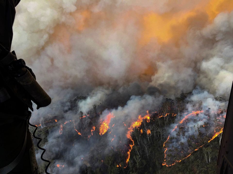  Flames tear through the bush as Australia braces for even worse