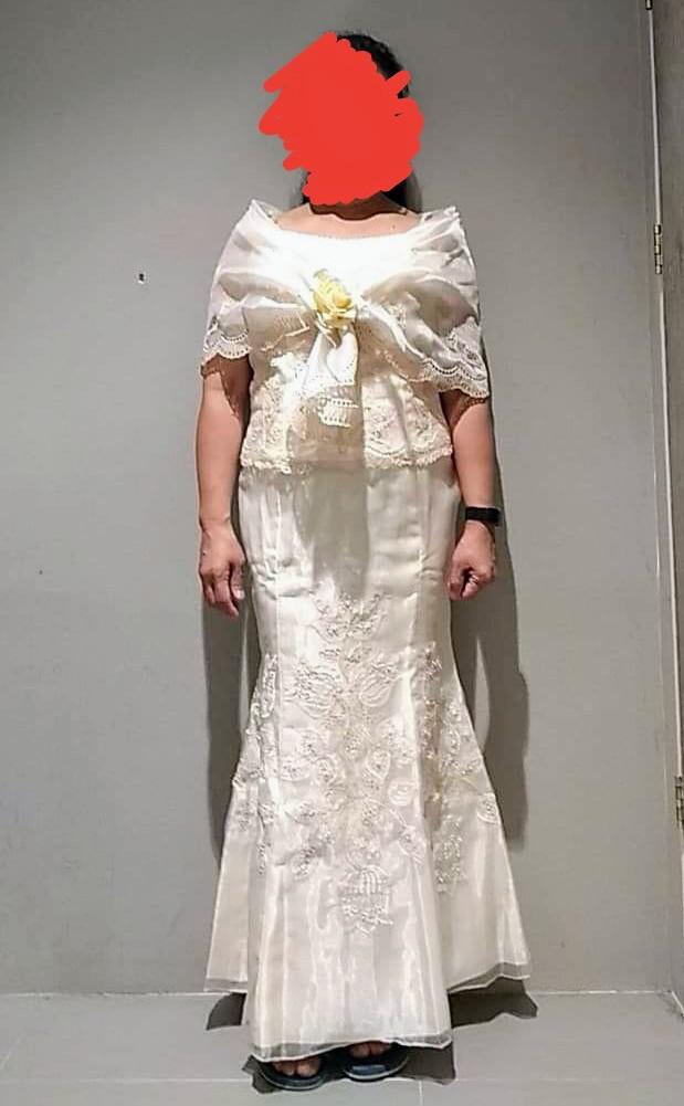 The bride-to-be shared a snap of the white gown her mum was planning on wearing