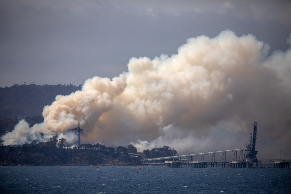  Smoke billows into the sky in Eden, New South Wales