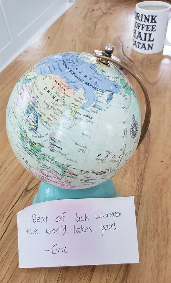  One social media user presented their colleague - a 'flat earther' with a globe on their last day at work