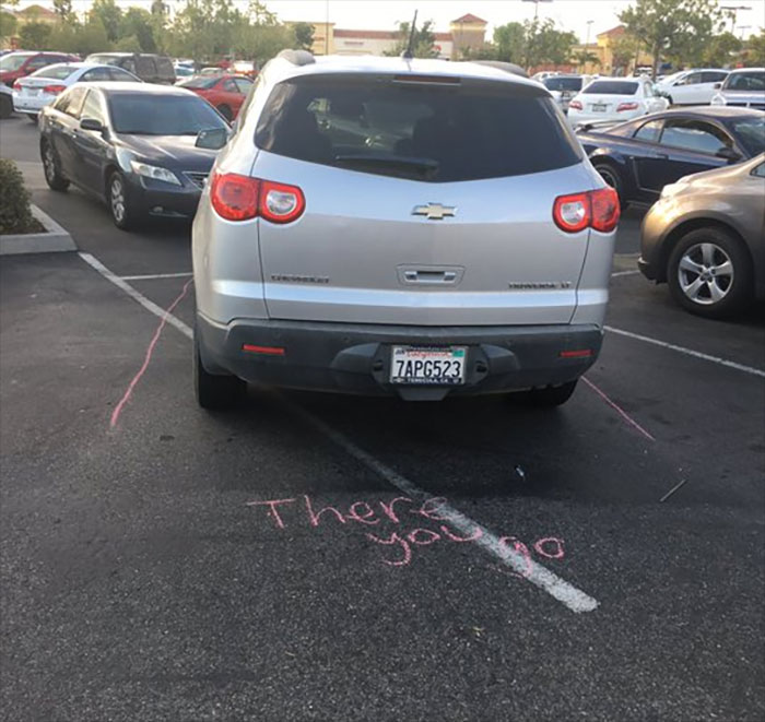  One social media user wrote they had carried chalk in their car for almost a year, just so they could take this sweet revenge on a bad parker