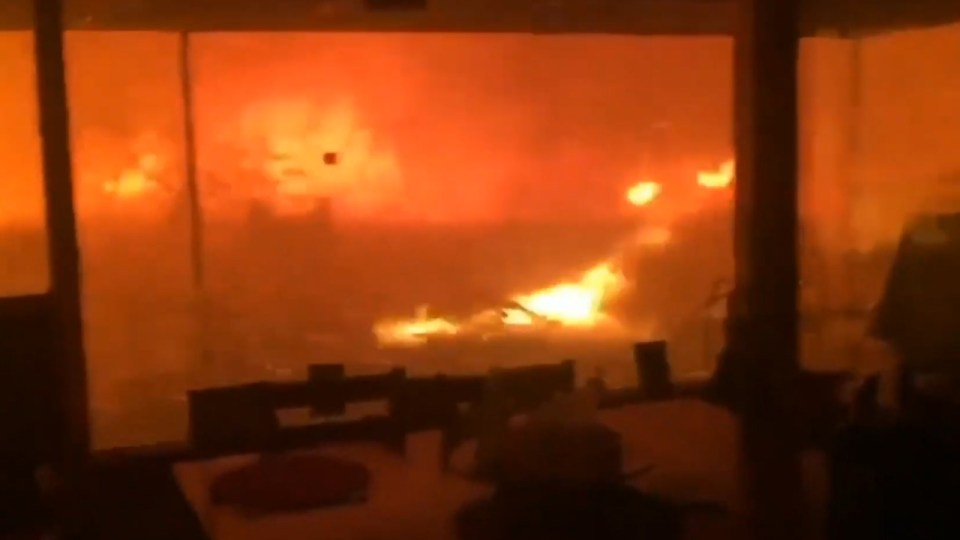  The heart-stopping video shows a firestorm engulfing the Davis family home, as the men remain trapped inside