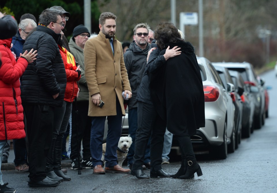  Former Partick Thistle director Jacqui Low hugs Colin's pals today