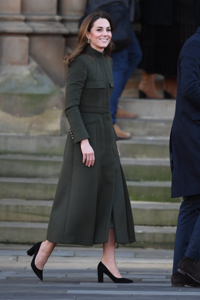  Kate Middleton smiles as she arrives, despite the chaos around the royal family