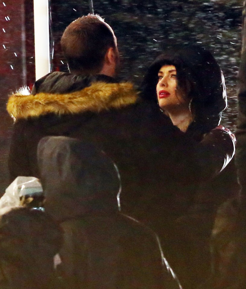  Danny Dyer and co-star Shona share a word as they take a break from filming on set