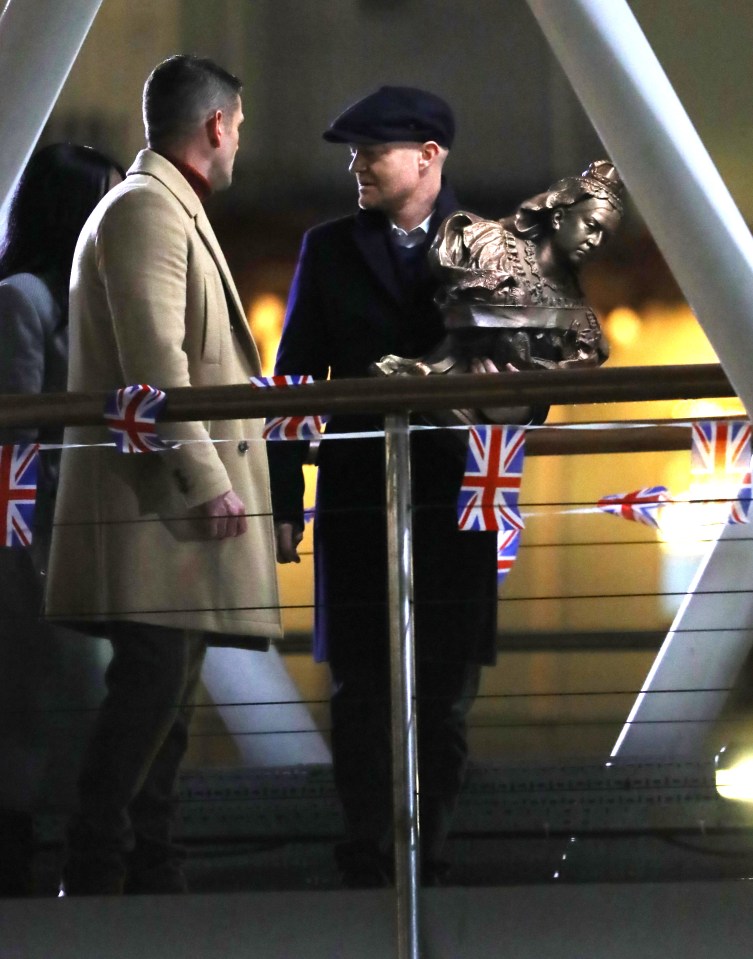  Max and Jack Branning will appear at the party with Max carrying the Queen Vic's bust