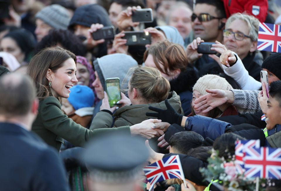  The relaxed looking Duchess shook hands with people who had waited to greet her