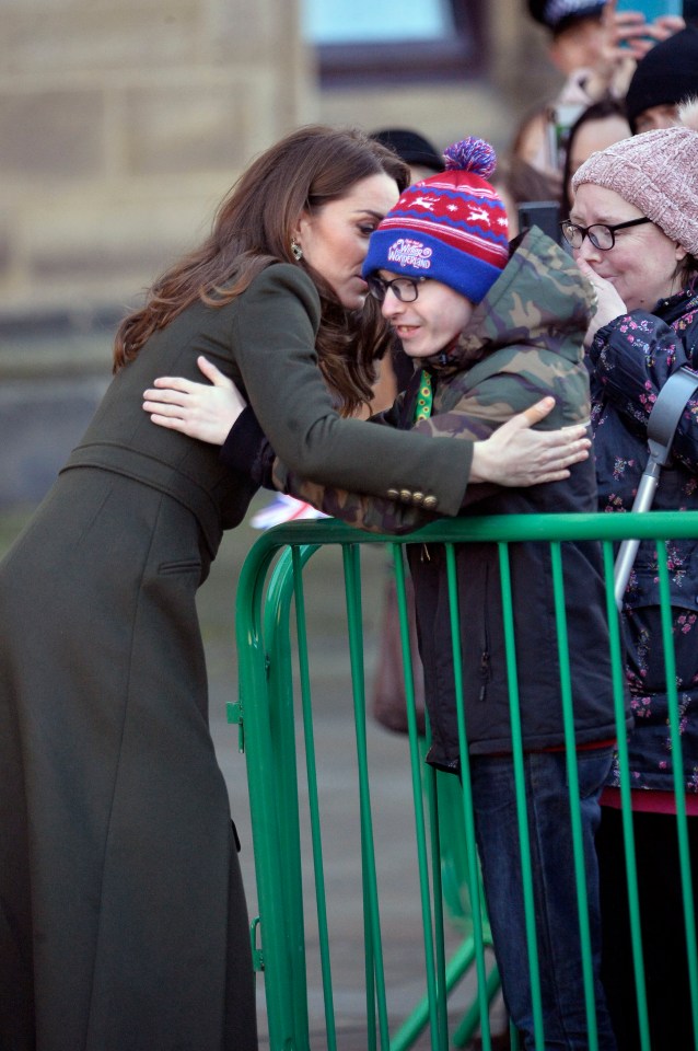  She told him how much she liked his coat, as the woman with him became emotional