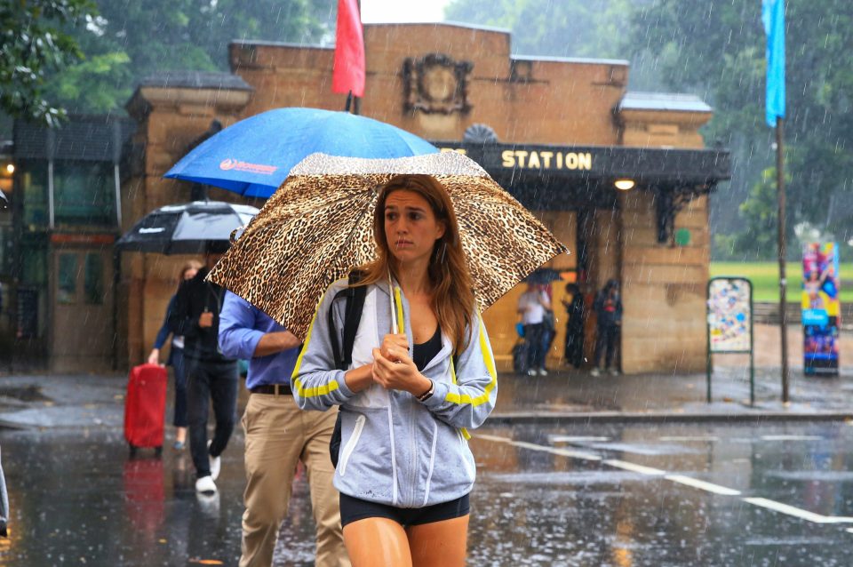  Sydney commuters braved the city's wettest day for four months