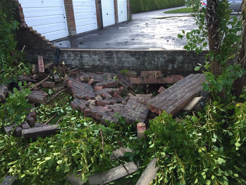  A 30ft long brick wall collapsed under the strength of the gusts