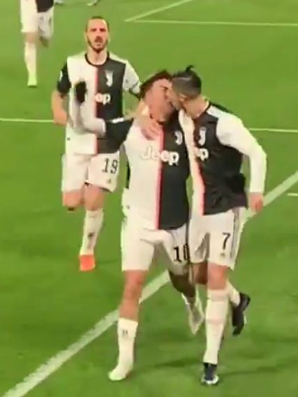  This still taken from a video of the Juventus celebrations appears to show Cristiano Ronaldo kissing Paulo Dybala